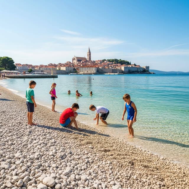 Children playing on Banj Beach with the iconic view of Šibenik's old town